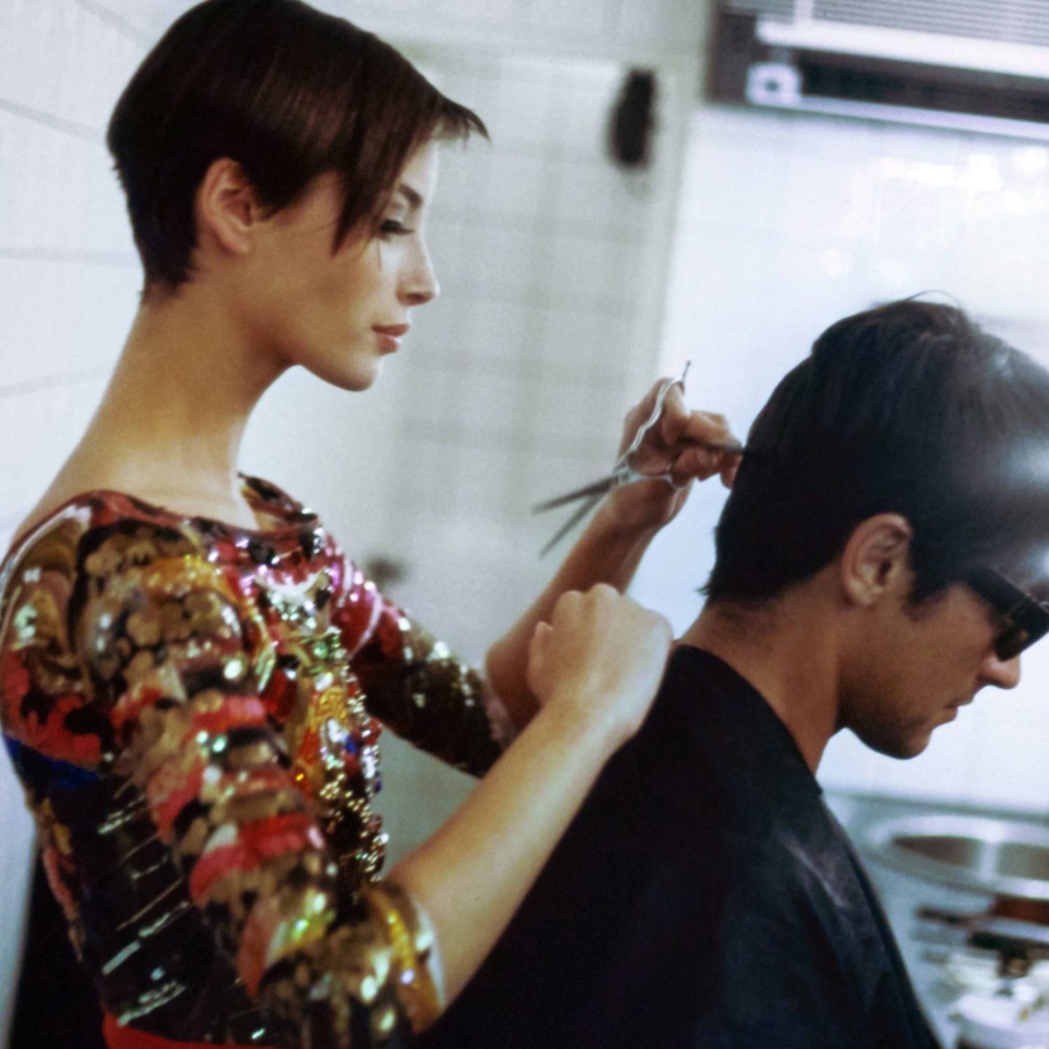 Female hair stylist with Customer